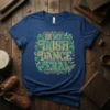 T-shirt with "In My Irish Dance Era" text, surrounded by shamrocks and floral elements, with a butterfly graphic