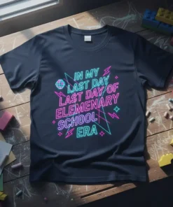 Neon retro graphic tee with text "In My Last Day Last Day of Elementary School ERA" in pink and teal