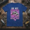 In My Monster Truck Mama Era text design with a cartoon monster truck graphic on a blue t-shirt
