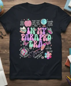 Groovy "In My Parapro Era" text design with school icons like books, globe, and apple on a black t-shirt