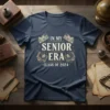 In My Senior Era Class of 2024 graduation t-shirt design with books and floral accents