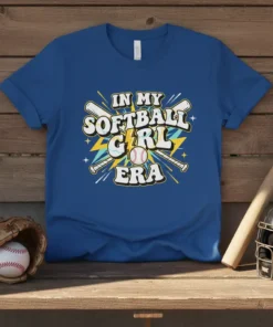 In My Softball Girl Era text design with softball bats and a baseball graphic on a blue t-shirt