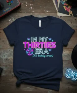 In My Thirties Era (30's birthday version) text with neon glow and butterfly graphics on a navy t-shirt