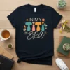 In My Titi Era text in retro font with colorful letters and floral accents on a navy t-shirt