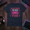 In October We Wear Pink t-shirt design featuring a pink video game controller and circuit board pattern, promoting breast cancer