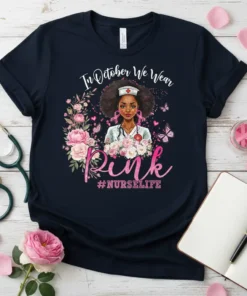 In October We Wear Pink #Nurselife t-shirt design featuring a Black nurse with pink flowers and butterflies