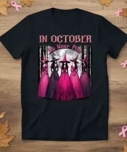In October We Wear Pink t-shirt design with five witches in pink dresses and hats, supporting breast cancer awareness