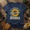 In a World Full of Grandmas Be a Bubba quote with a yellow sunflower graphic on a navy blue t-shirt