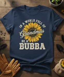 In a World Full of Grandmas Be a Bubba quote with a yellow sunflower graphic on a navy blue t-shirt