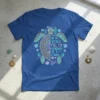 T-shirt with "In A World Full Of Grandmas Be A Oma" text inside a decorative sea turtle design, surrounded by