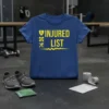 Injured List funny gym t-shirt with shield, crossbones, and runner graphics in yellow on a blue shirt