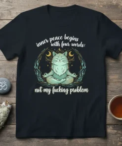 Meditating cat graphic with text "inner peace begins with four words: not my fucking problem" on a black t-shirt