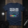 INSTALLING MUSCLES PLEASE WAIT.... eye-catching graphic design printed on comfortable cotton t-shirt
