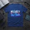 Integrity Will Create Your Passion quote on a blue t-shirt, featuring white and neon pink text with a city skyline