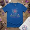 International Women's Day #InspireInclusion t-shirt with vibrant abstract design and butterflies