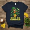 Irish Jig Champion text with a dabbing leprechaun graphic on a navy t-shirt, surrounded by shamrocks and gold coins