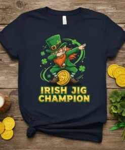 Irish Jig Champion text with a dabbing leprechaun graphic on a navy t-shirt, surrounded by shamrocks and gold coins