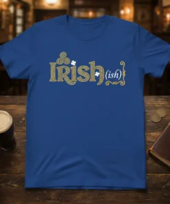 Blue t-shirt with gold "Irish(ish)" text in a Celtic knot font, featuring small shamrocks