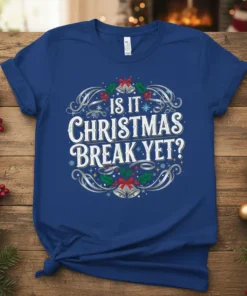 Is It Christmas Break Yet? text with festive bells, holly, and snowflakes graphic on a blue t-shirt