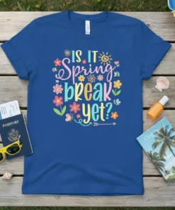 Is It Spring Break Yet? text design with flowers, sun, butterflies, and an arrow on a blue t-shirt