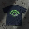 T-shirt with green text "IS MY BIKE OK? BOKE IS MY BIKE OK?" around a gear graphic