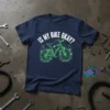 Is My Bike Okay? funny cycling t-shirt with neon green bicycle graphic and distressed text on navy blue shirt