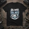 Black t-shirt with "IS MY SLED OK?" text in distressed silver and blue, featuring a snowmobile graphic and track details