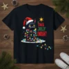 Black cat wearing Santa hat tangled in colorful Christmas lights with text "is THIS JOLLY ENOUGH?"