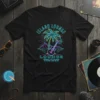 Island Lounge neon sign style graphic t-shirt with palm tree, guitar, and mountains, text reads "ISLAND LOUNGE WHERE THE DRINKS