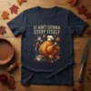 Thanksgiving t-shirt with "It Ain't Gonna Stuff Itself" text and a cartoon chef turkey holding a spoon