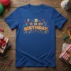 It Is My Birthday text design with cake and balloons on a blue t-shirt