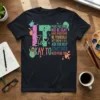 T-shirt with colorful text: "IT IS OKAY TO MAKE MISTAKES NOT BE OKAY HAVE HARD DAYS BE YOURSELF NOT KNOW