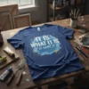 Navy blue t-shirt with white text "IT IS WHAT IT IS. IT IS WHAT IT IS." in bold font, surrounded