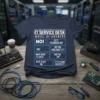 Navy blue t-shirt with "IT Service Desk Wheel of Answers" design featuring troubleshooting questions like "Is it plugged in?" and