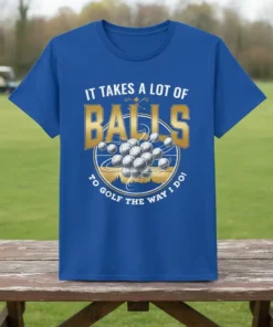It Takes A Lot Of Balls To Golf The Way I Do quote on a blue t-shirt with a graphic