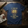 It Took Me 49 Years To Look This Good text with decorative flourishes and the number 49 on a navy