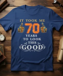 It Took Me 70 Years To Look This Good t-shirt design with bold orange 70 and thumbs-up graphics