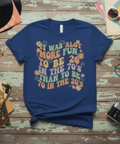 Retro t-shirt with colorful text: "It was alot MORE FUN TO BE 20's IN THE 70's THAN TO BE 70