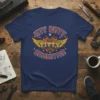 Navy t-shirt with "ITTY BITTY TITTY COMMITTEE" text in a distressed, retro style with wings and flames graphic