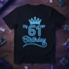 It's 61st Birthday t-shirt with neon blue text and a crown graphic, celebrating a milestone