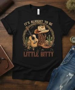 It's Alright To Be Little Bitty cowboy t-shirt with guitar, boots, and hat design