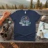Navy t-shirt with "It's Another HALF MILE OR SO" text and a graphic of a hiker with mountains and sun