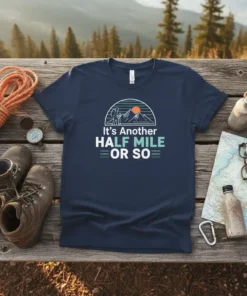 Navy t-shirt with "It's Another HALF MILE OR SO" text and a graphic of a hiker with mountains and sun