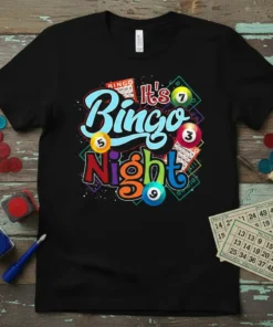 It's Bingo Night text with colorful bingo balls and cards graphic on a black t-shirt