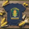It's Corn! A Big Lump With Knobs It Has The Juice t-shirt design featuring a smiling corn character holding a