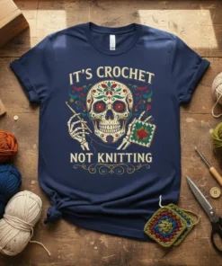 It's Crochet Not Knitting t-shirt with a colorful sugar skull holding crochet hooks and yarn