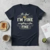 It's fine I'm Fine Everything Is Fine text design with diamond graphic on a navy blue t-shirt