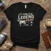 It's Going to Be Legend Dairy text with a cow and milk jug graphic on a black t-shirt
