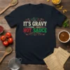 It's Gravy Not Sauce text design in festive red, white, and green on a navy t-shirt