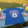 It's Great To Be 8 text with donut graphic and balloons on a blue t-shirt for an 8th birthday